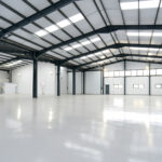 Designing Warehouse Floors for Automation: What to Consider for AGVs and Robotics